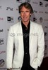 Rosie Huntington-Whiteley and Michael Bay attend Maxim Hot 100